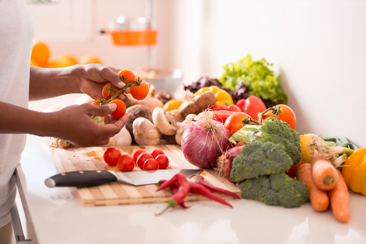 Diabetes Guide Woman pulling tomatoes off the vine
