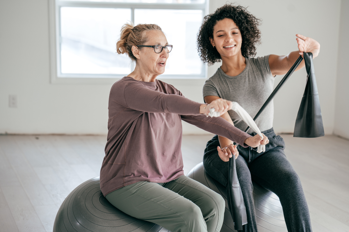 Women working on resistance excersises